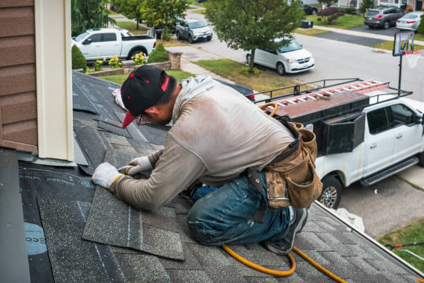 Professional Gutter Installation technician working in Harbert, MI
